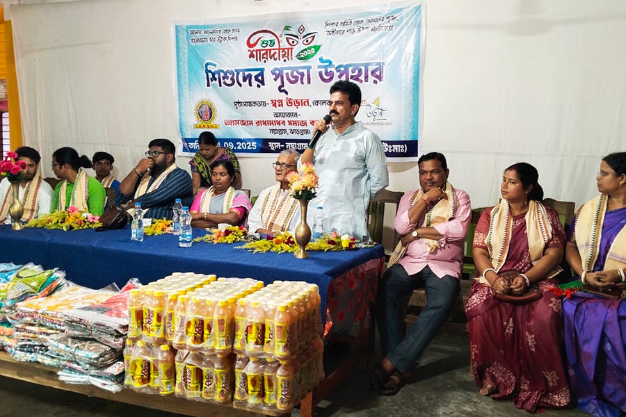 Clothes cum fruit juice distribution in durja puja